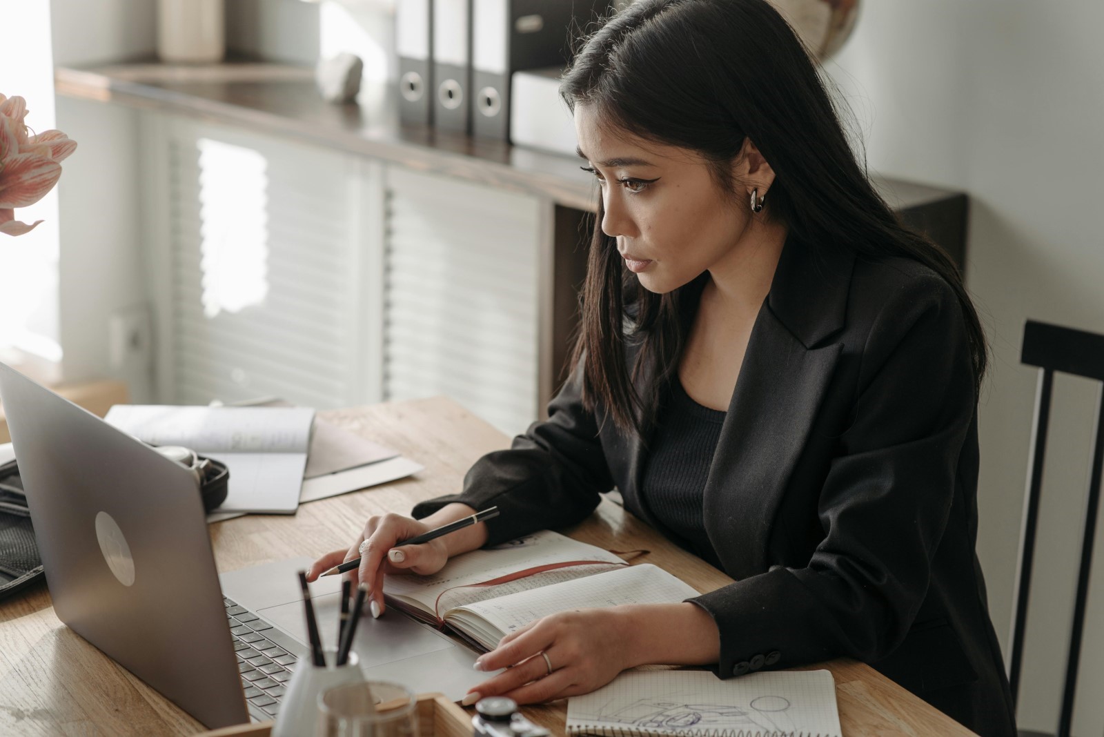 Insurance professional taking online course in office setting