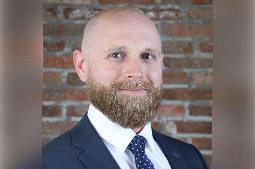 How might an economic slowdown impact commercial insurance in Canada?