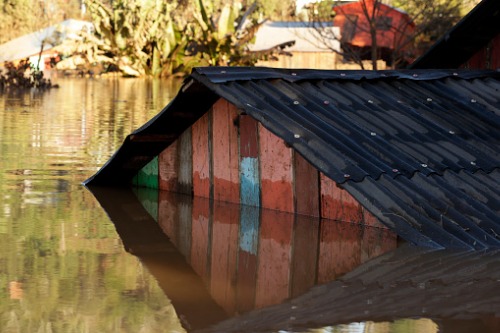 Flood-stricken areas face “many, many months” of recovery