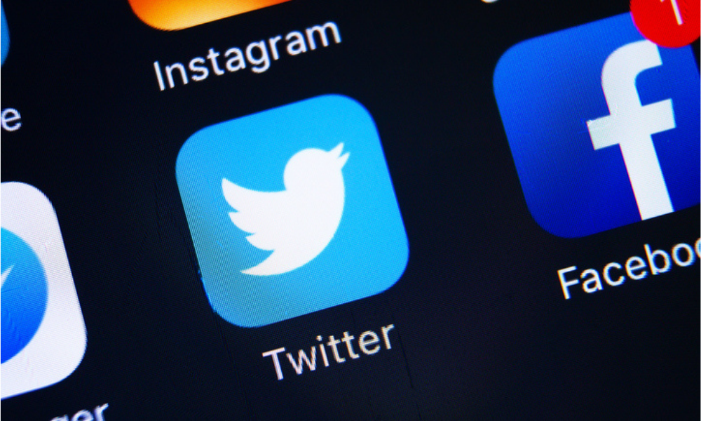 Twitter execs depart, hiring freeze begins