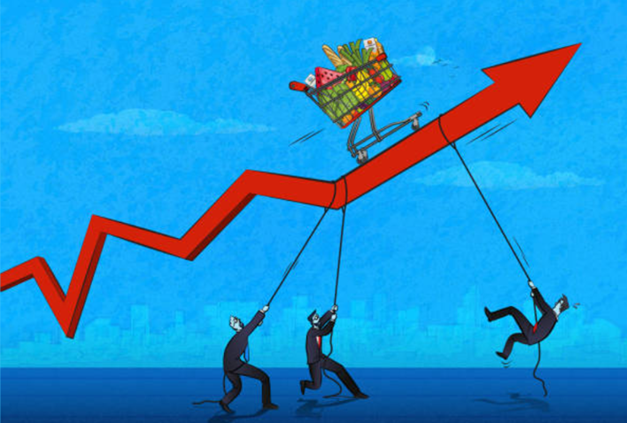 an illustration showing a supermarket cart on an upward line graph, a depiction of rising inflation rates