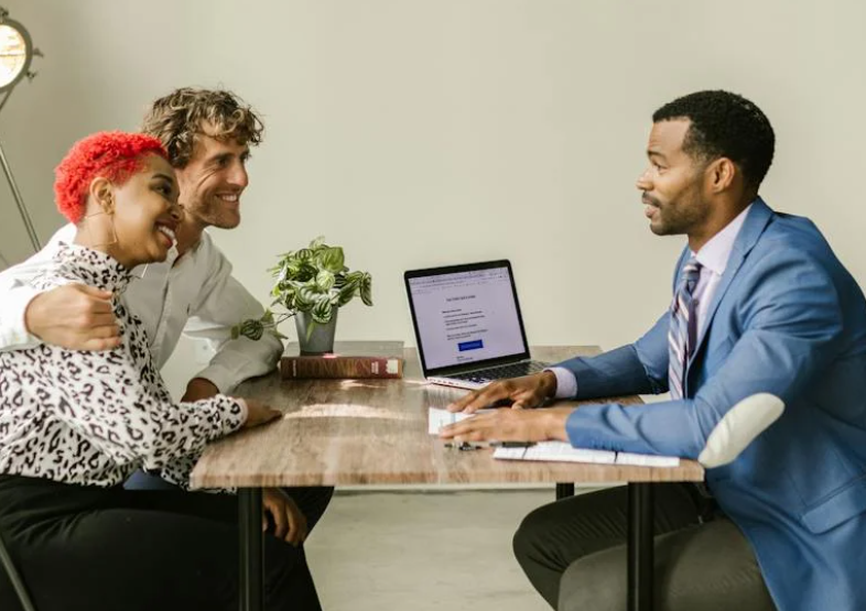 a mortgage broker discusses the lending services offered by the West Brom to his clients