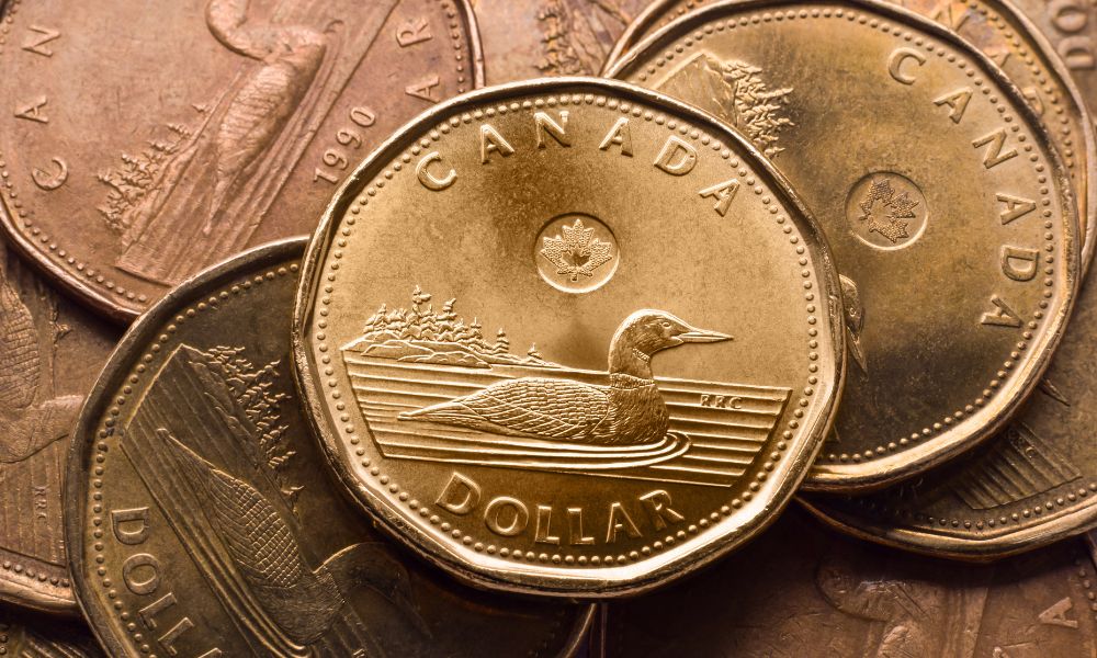 The loonie slides toward 70 cents US on a surging US dollar
